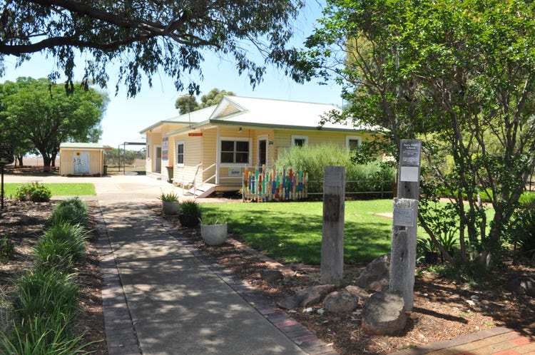 Photo of school building and garden